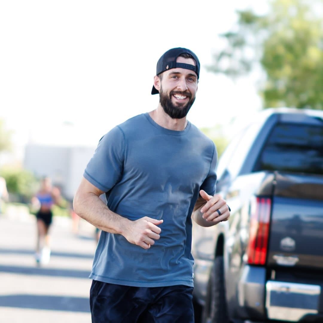 Caleb running outdoors